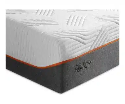Matelas TEMPUR blanc au motif matelassé, avec base grise et bordure orange. Logo TEMPUR visible sur le côté.
