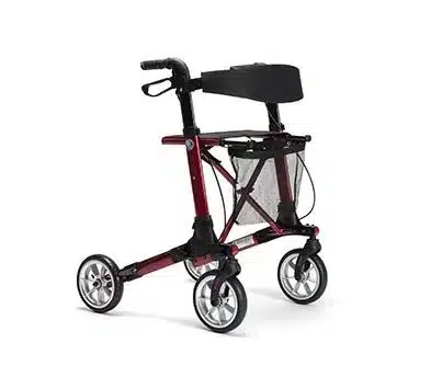 Déambulateur rollator rouge 4 roues avec siège, dossier et sac de rangement. Aide à la mobilité pour seniors.